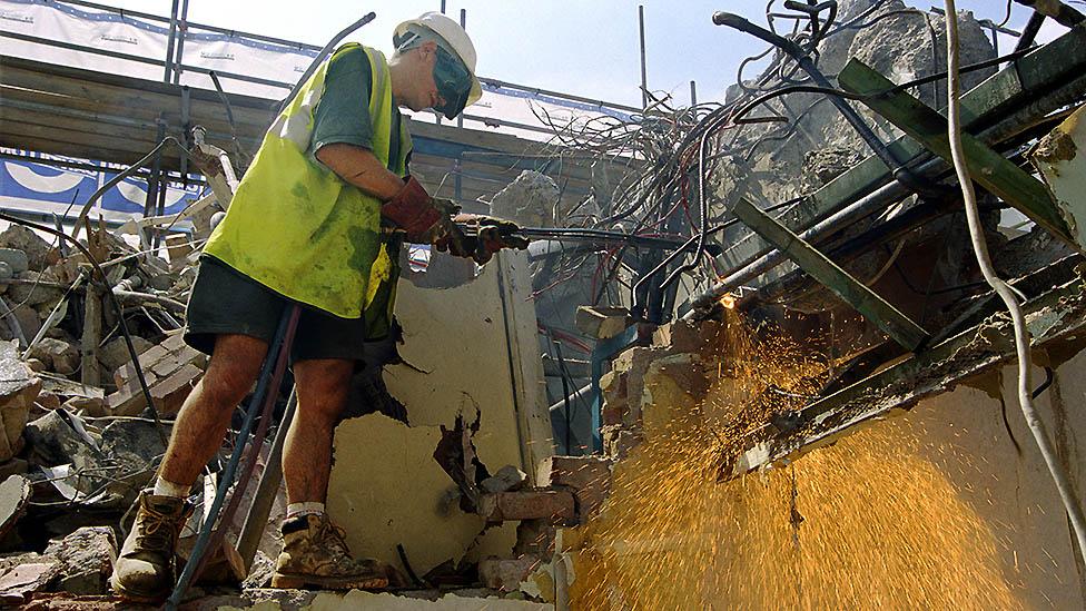 Construction worker welding in central London