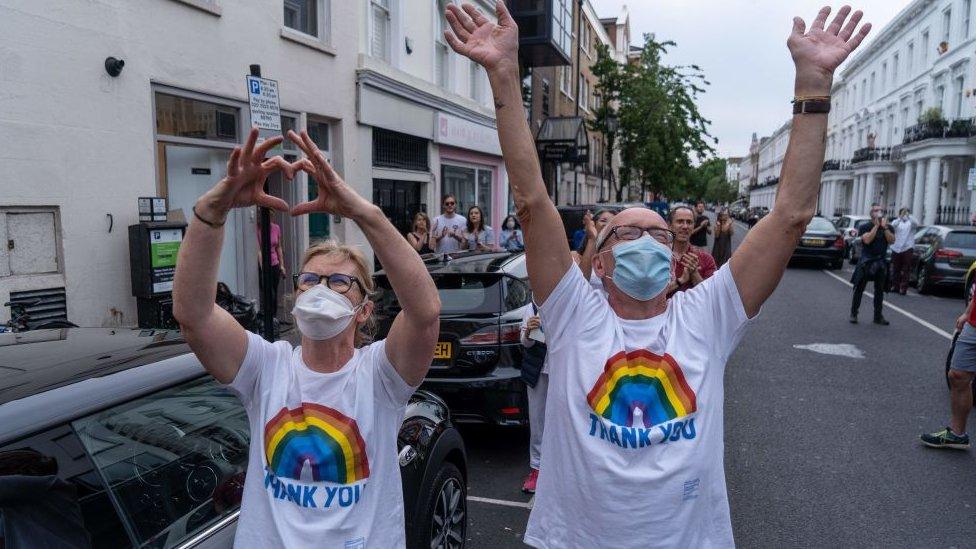 Members of the public participate in "clap for carers" in May