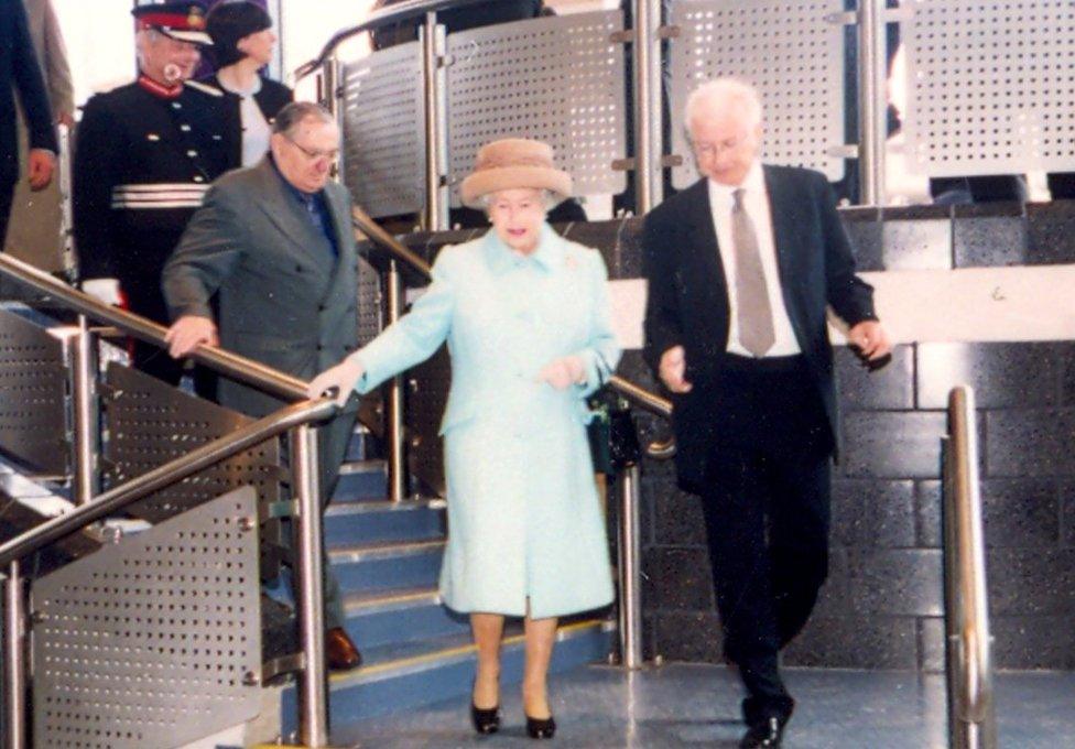 Queen Elizabeth II with Nexus director general Mike Parker during her visit to the Tyne and Wear Metro in May 2002, when she officially opened its Sunderland line