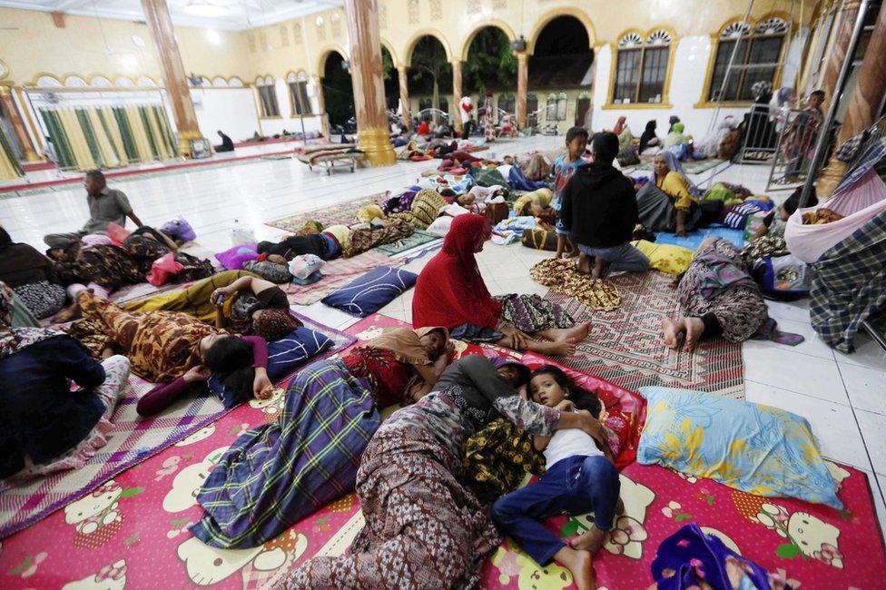 Survivors take rest at the evacuation center at Meureudu Pidie Jaya after an earthquake struck Pidie Jaya district, Aceh, Indonesia, 7 December 2016.