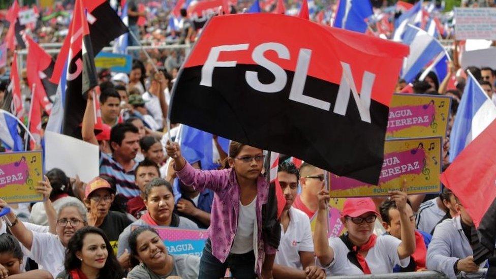 Supporters of Nicaraguan President Daniel Ortega and his Sandinista National Liberation Front (FSLN) party, gather to show their support to the president as the opposition demands him to step down, in Managua on May 26, 2018.