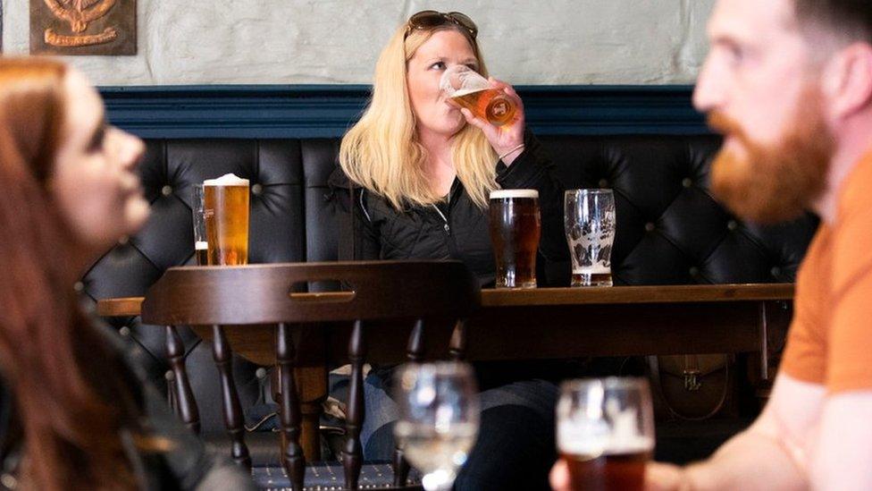 Drinkers in the Scotsman Lounge, Edinburgh