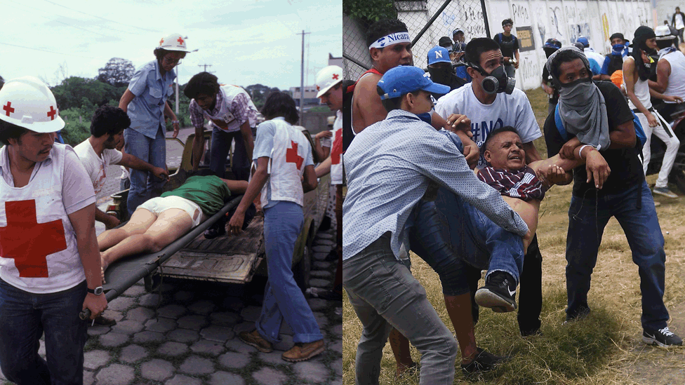 First aiders carry a person in 1979/Anti-government protesters help an injured partner during clashes within the 'Marcha de las Flores' in Managua, on June 30, 2018