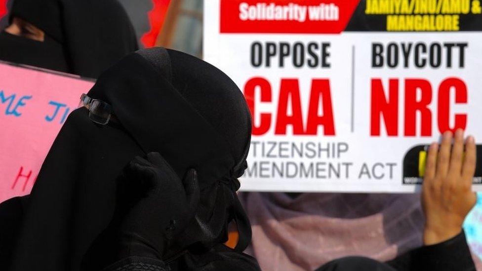 Indian protesters from different non-governmental organizations hold placards as they protest against the Citizenship Amendment Act (CAA) in Bangalore, India, 12 January 2020