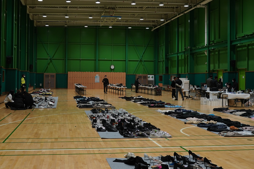 Items spread out in the sports hall