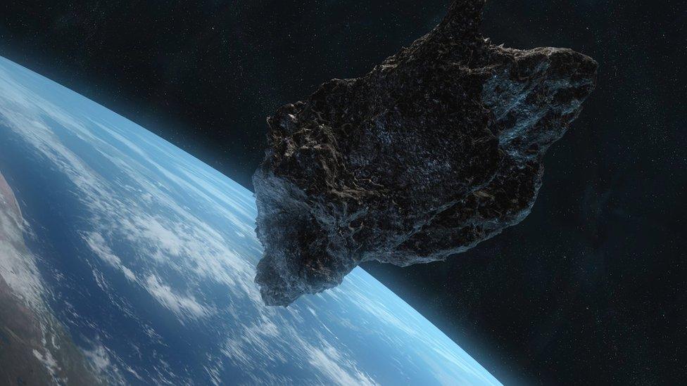 Asteroid and Earth.