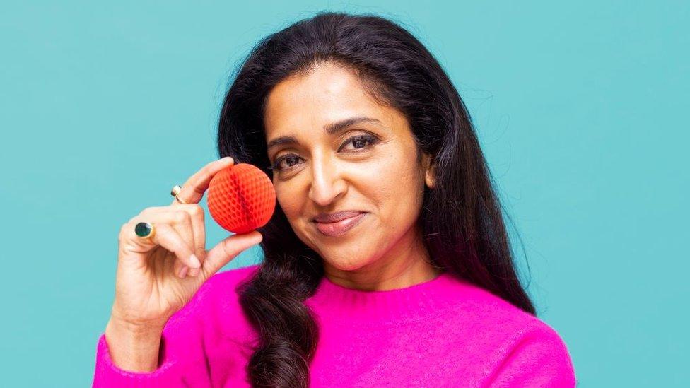 Sindhu Vee holding Comic Relief Red Nose Day nose