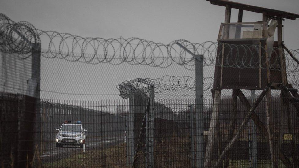 Police patrol the Hungarian border fence with Serbia on 18 January, 2019