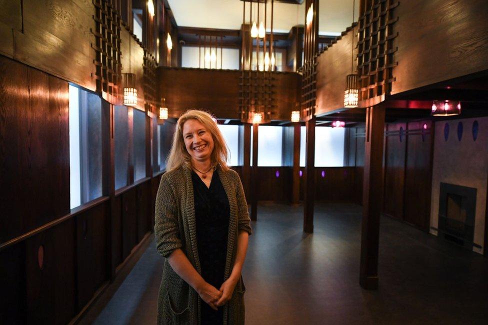 Alison Brown of Glasgow Museums stands inside the Charles Rennie Mackintosh Oak Room which was meticulously restored inside the V&A