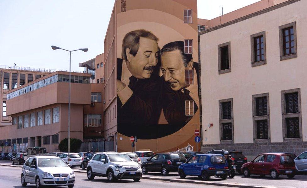 Palermo mural shows murdered judges Giovanni Falcone (L) and Paolo Borsellino, 8 Aug 19