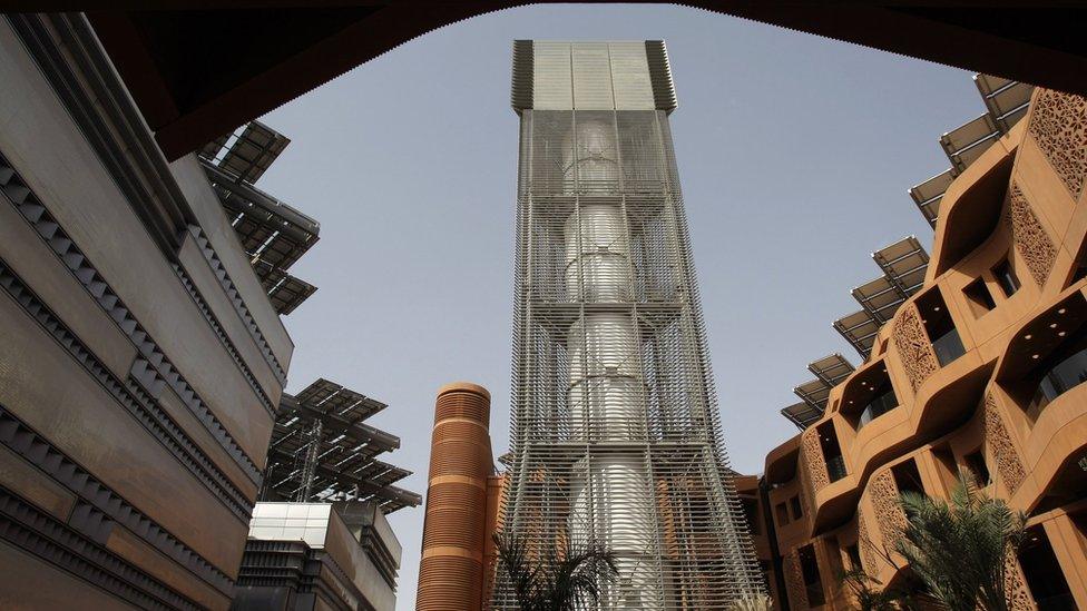 Wind tower and PV panels, Abu Dhabi (Image: AP)