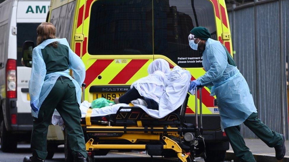 Patient being taken into Royal London