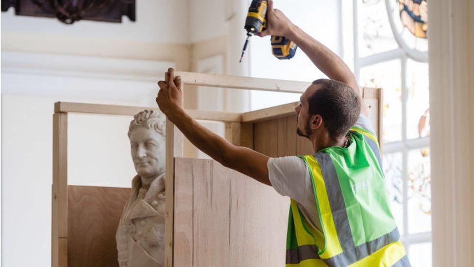 Statue of enslaver and Waterloo war hero Sir Thomas Picton is boxed up in preparation for its removal in Cardiff City Hall on 24 July 2020