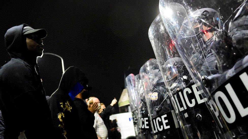 Demonstrators clash with riot police during a rally after the death of Walter Wallace Jr., a Black man who was shot by police in Philadelphia, Pennsylvania, US, 27 October 27, 2020.