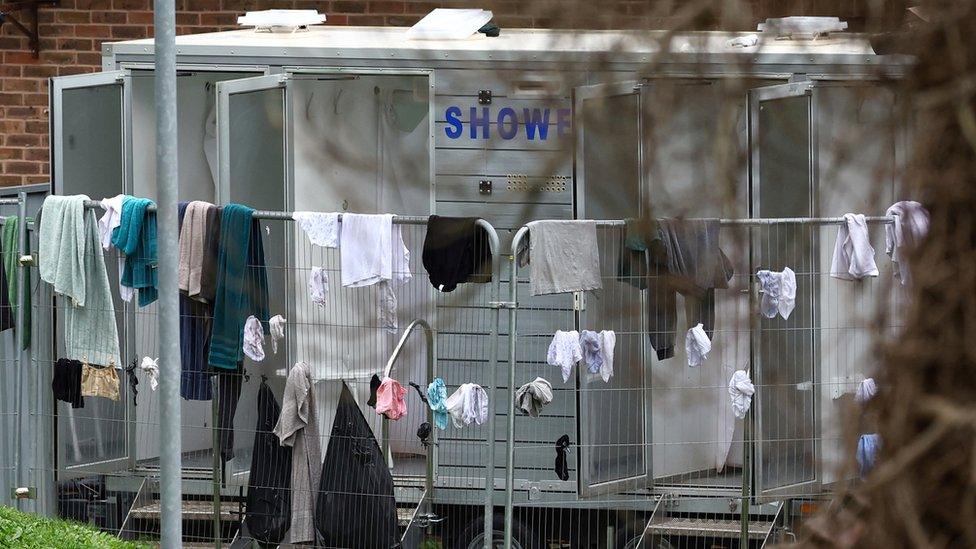 A shower area seen inside an immigration processing centre at Manston