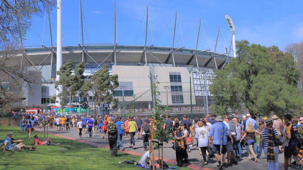 Crowds attending an Australian Rules football match at the Melbourne Cricket Ground in 2015