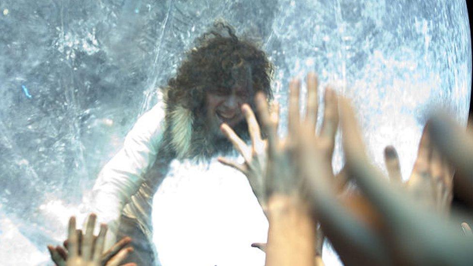 Flaming Lips frontman Wayne Coyne heads out into the crowd in a giant zorb, at Primavera Sound festival Barcelona in 2011