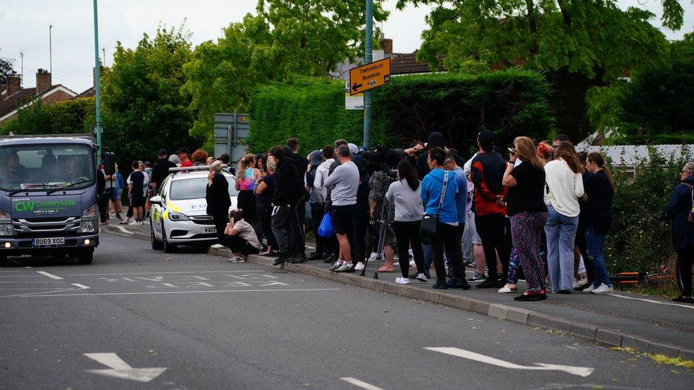 Parents awaiting pupils leaving the Tewkesbury School