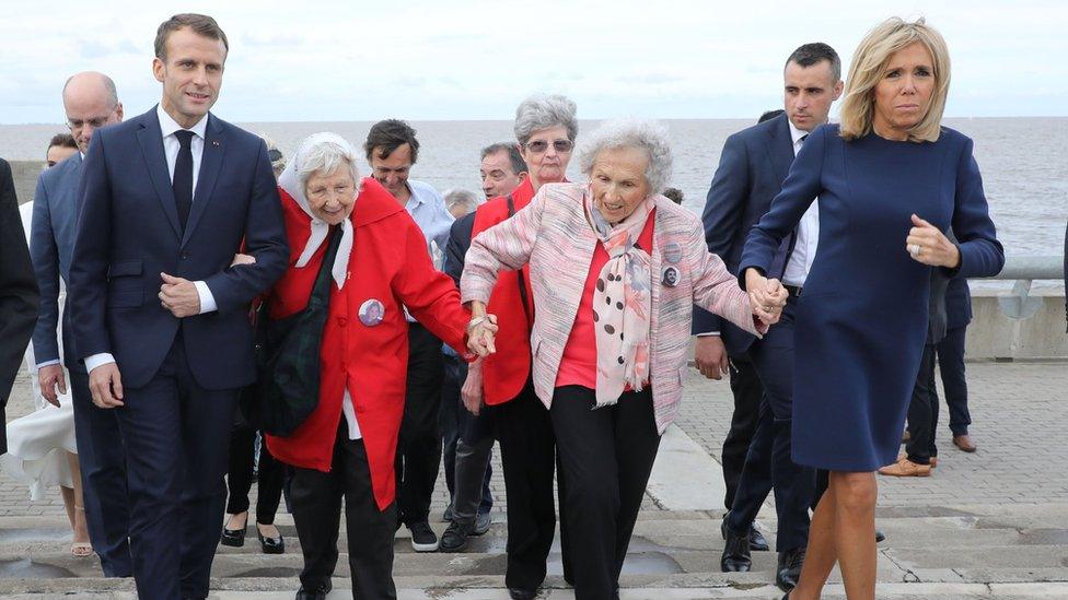 French President Emmanuel Macron and wife Brigitte Macron walk with Vera Vigevani de Jarach and Lita Boitano during a visit to the Remembrance Park in Buenos Aires. 29 Nov 2018