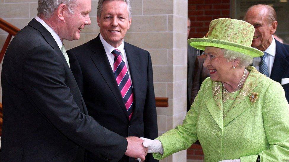 Martin McGuinness shakes hands with the Queen