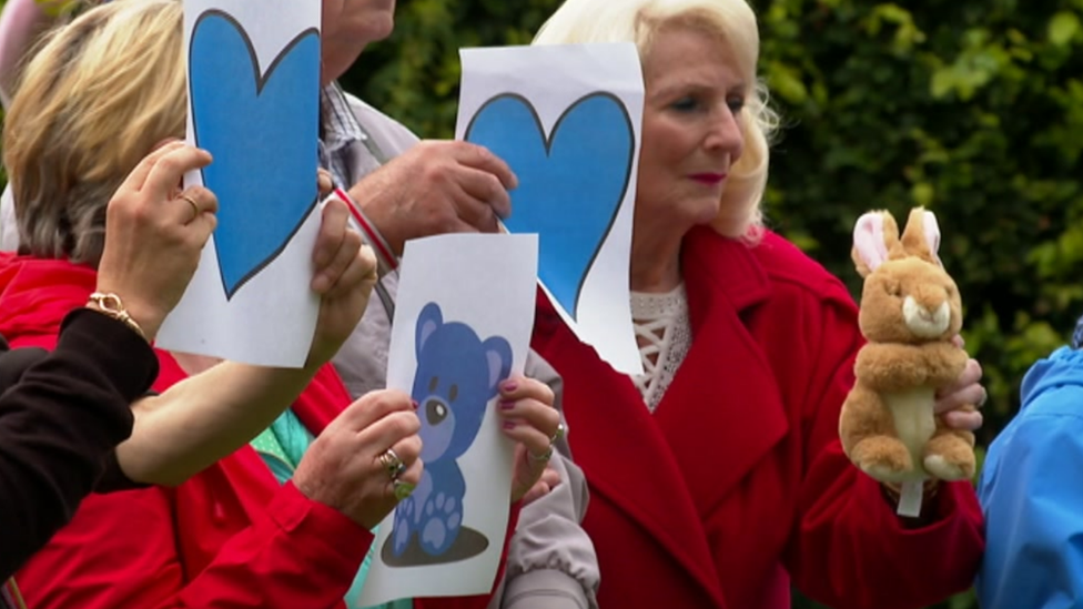 People with blue hearts