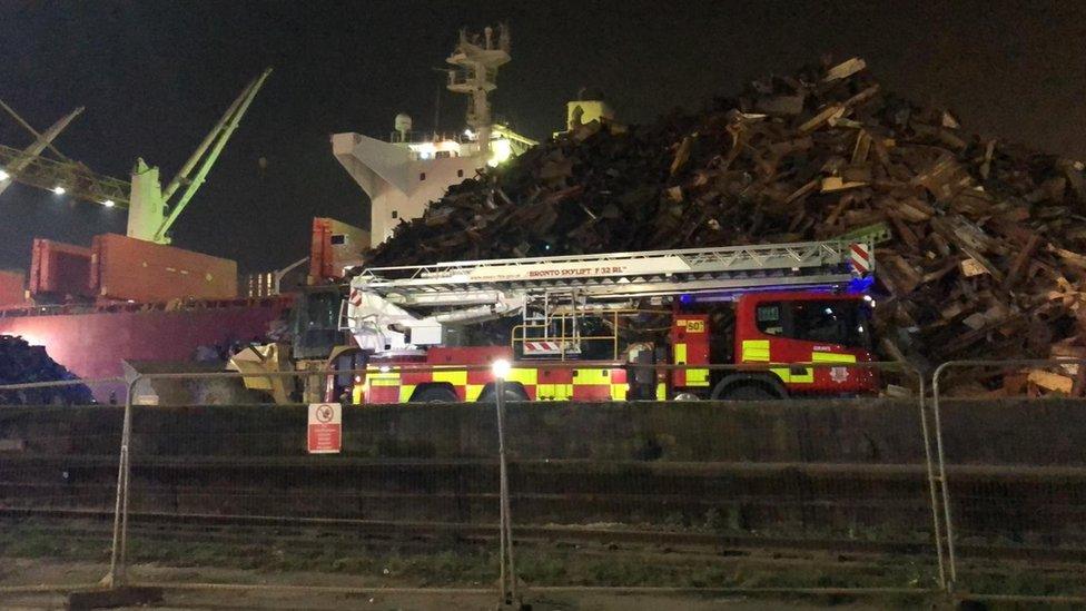 A fire engine at the Tilbury Docks because of a fire on a ship