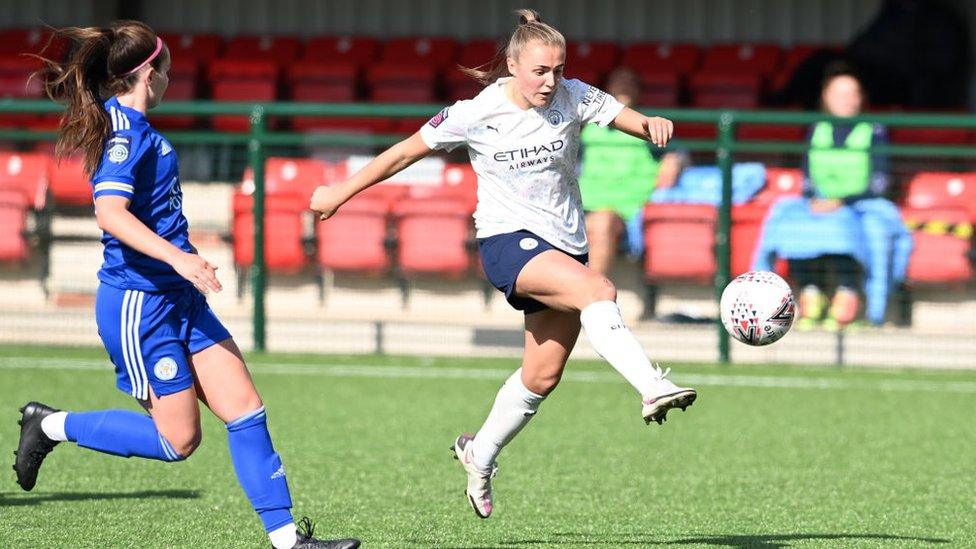 Georgia Stanway volleys the ball.