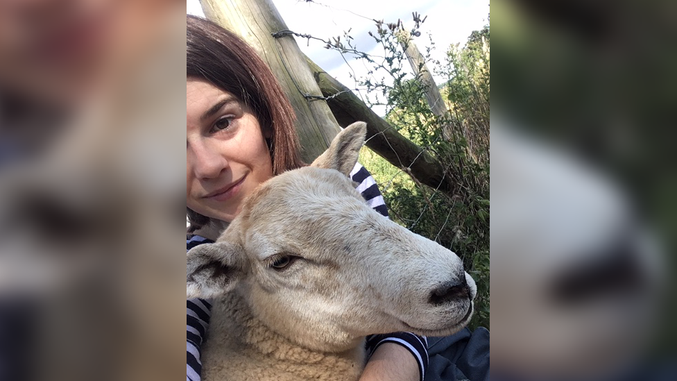 Laura Bartley with a sheep