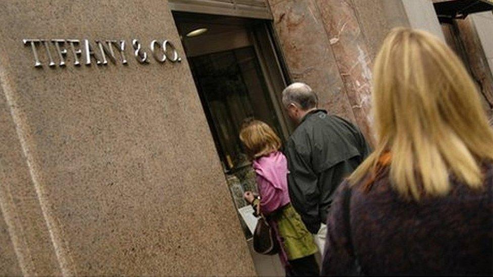 Shoppers heading into a Tiffany store in New York