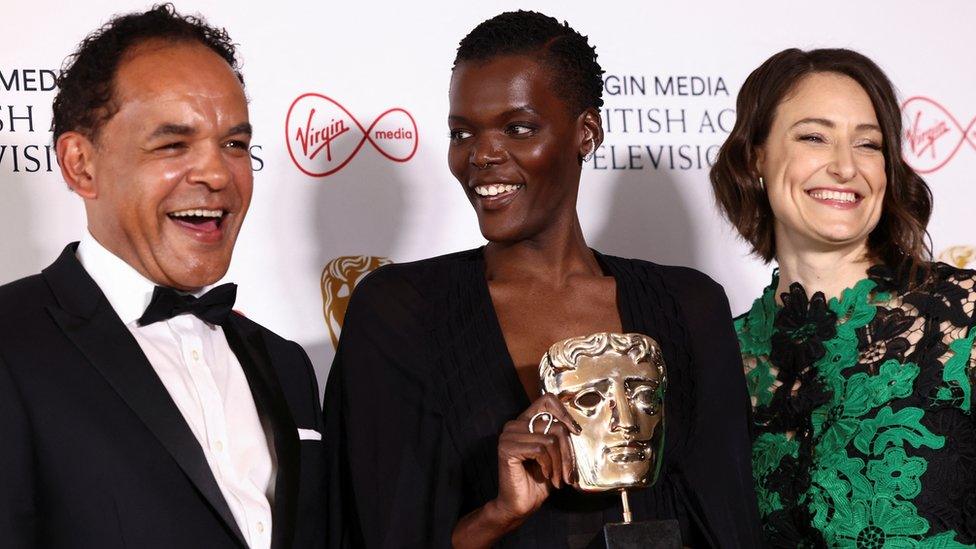 Producer Adele Romanski and actors Sheila Atim and Peter De Jersey at the Bafta TV Awards