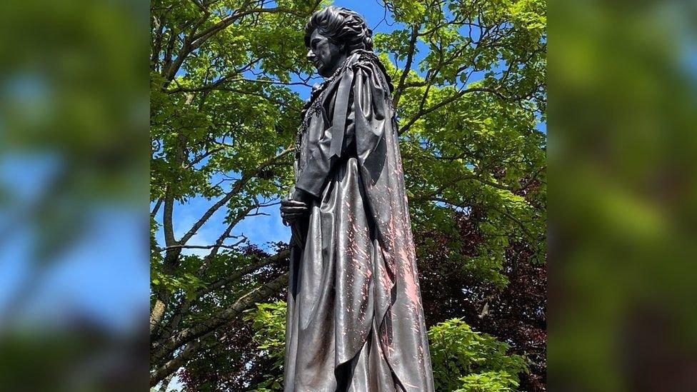 Margaret Thatcher statue with red paint spattered on it