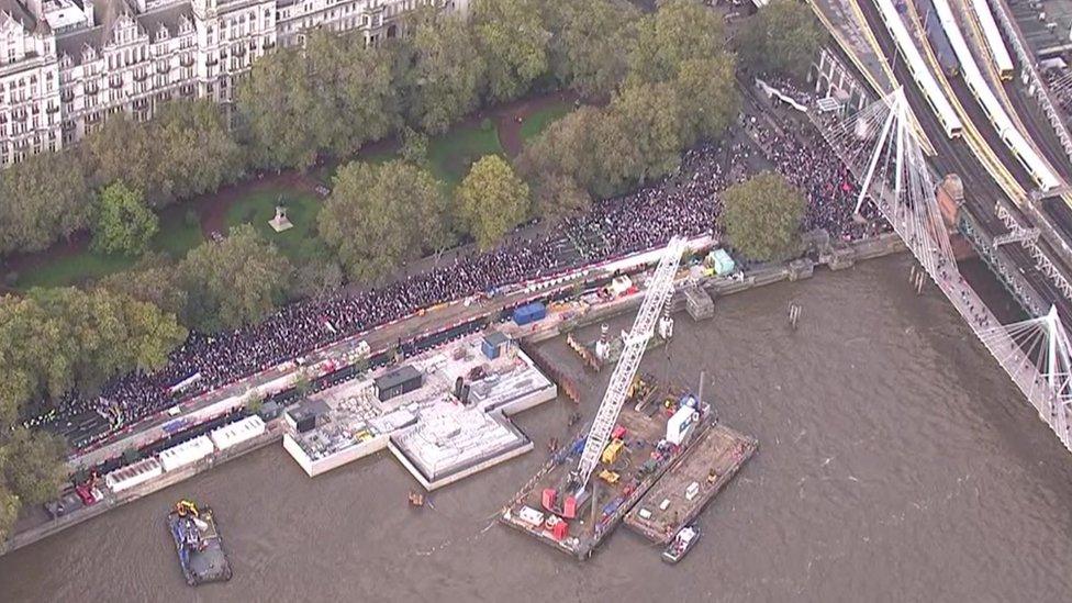 Thousands of pro-Palestinian protesters have gathered in central London with banners and posters