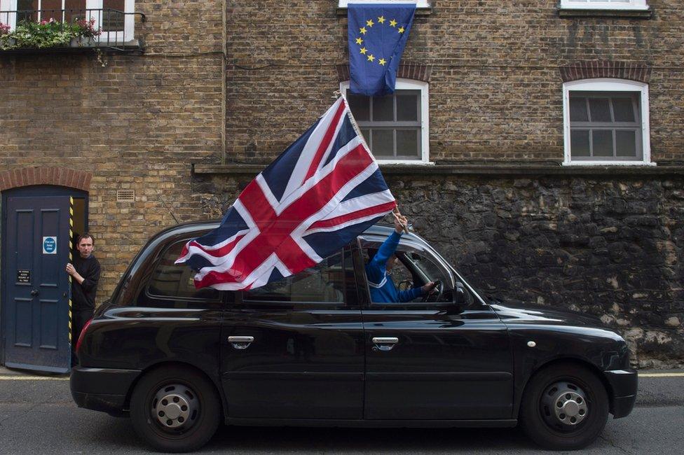 Black cab with union jack flag