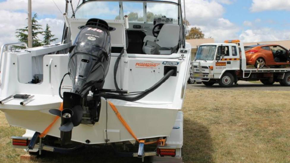 Moore's boat and one of his cars