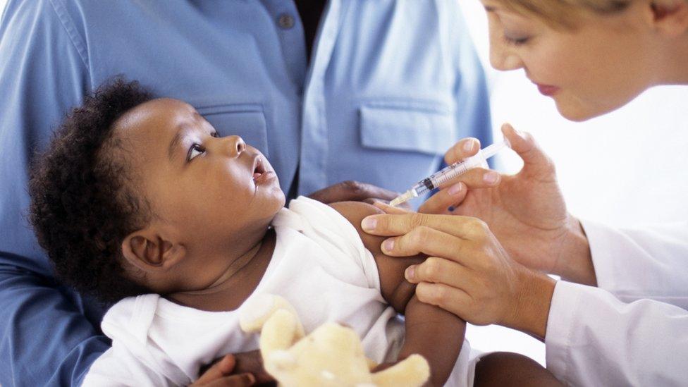 A baby being vaccinated