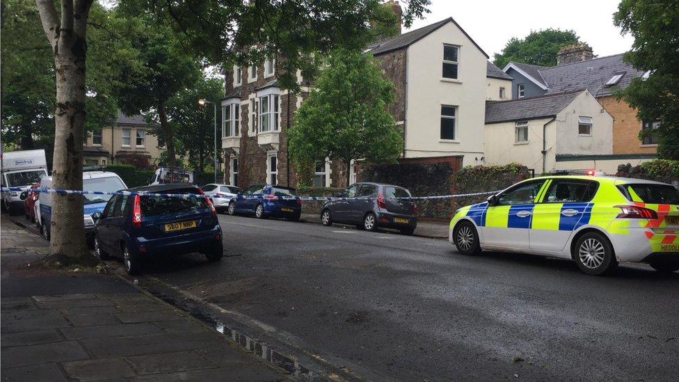 A police car and cordon on Oakfield Street, Roath