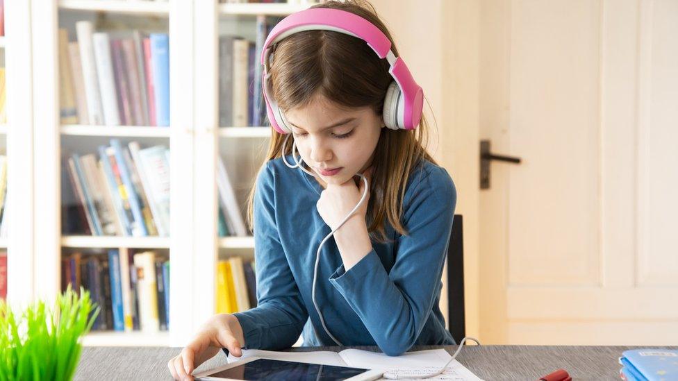 A school pupil doing online learning