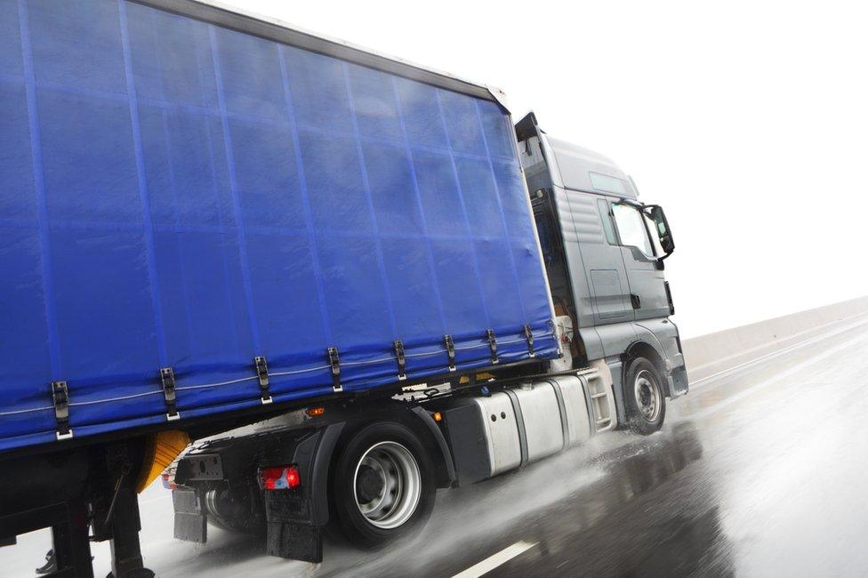 HGV on a wet road