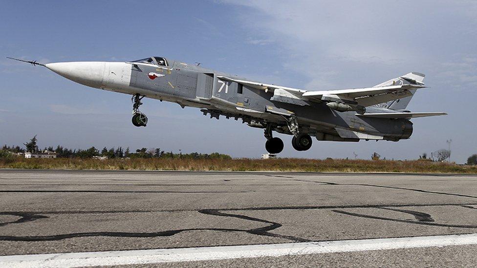 A Syrian Su-24 fighter jet taking off