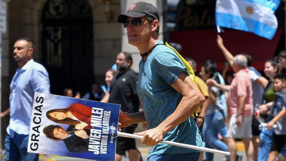 Supporters of the president of Argentina, Javier Milei, receive the politician in Buenos Aires, Argentina, 10 December 2023.