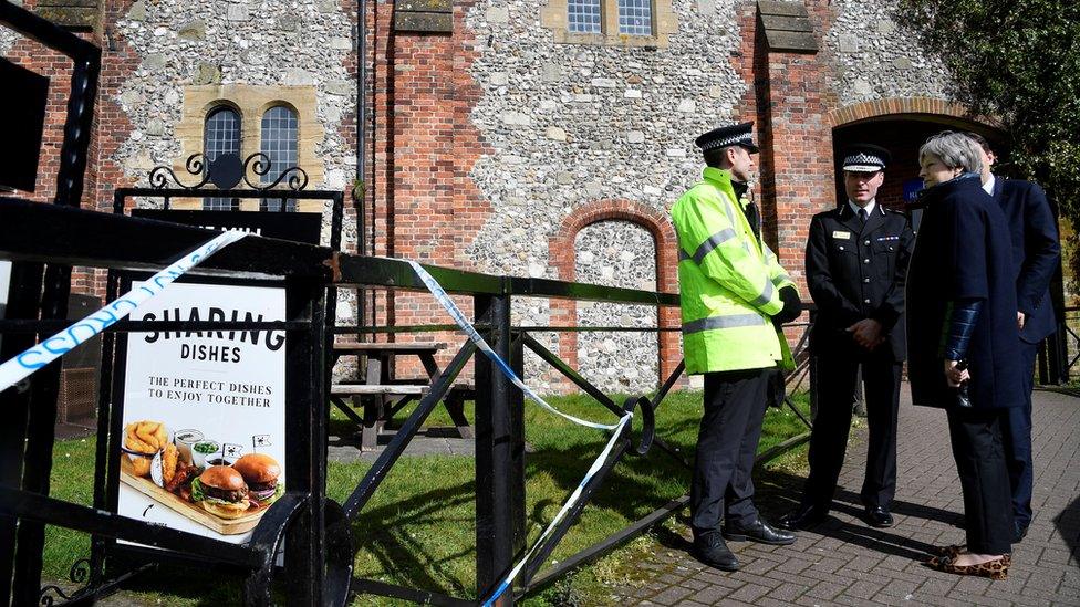 Theresa May visiting the scene at the Mill pub in Salisbury