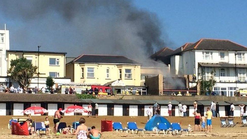 Smoke from burning buildings