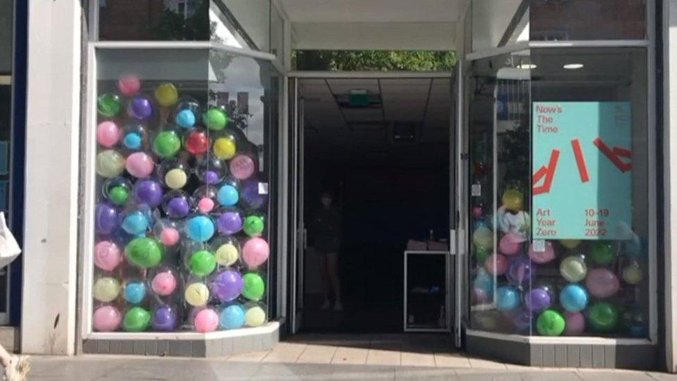 A shop front in Exeter, filled with an art installation