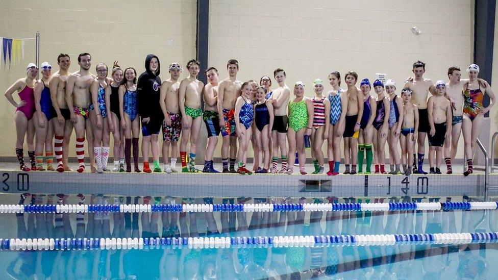 CBS Bluefins Swim club in their colourful socks.