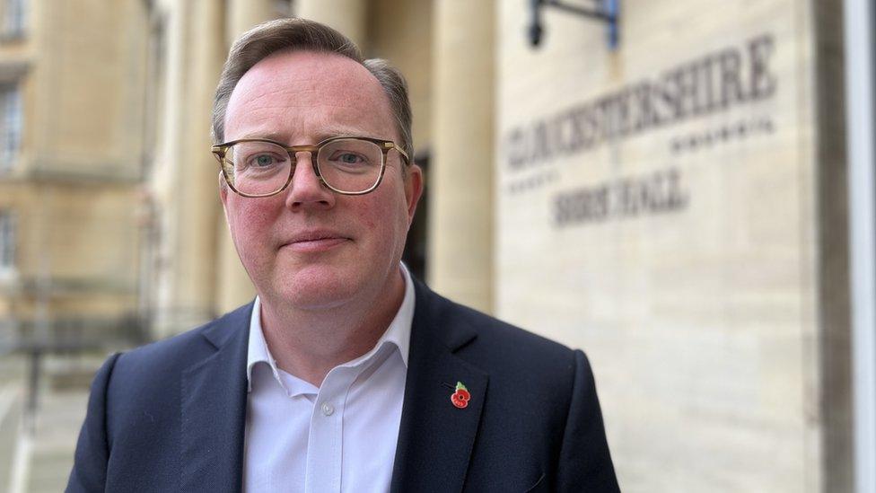 Councillor Mark Hawthorne standing outside Gloucestershire County Council