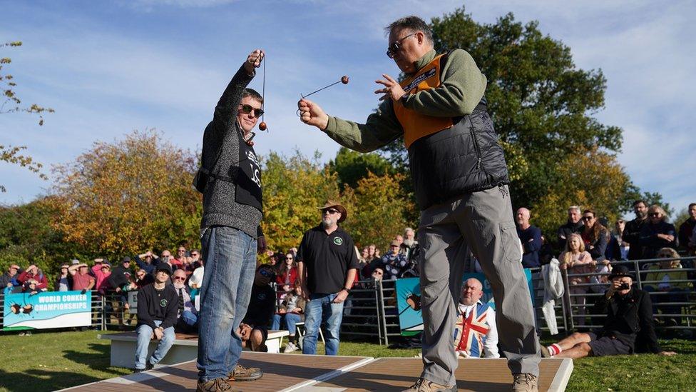 Randy Topolnitsky, from Calgary in Canada, takes the winning shot in the men's competition