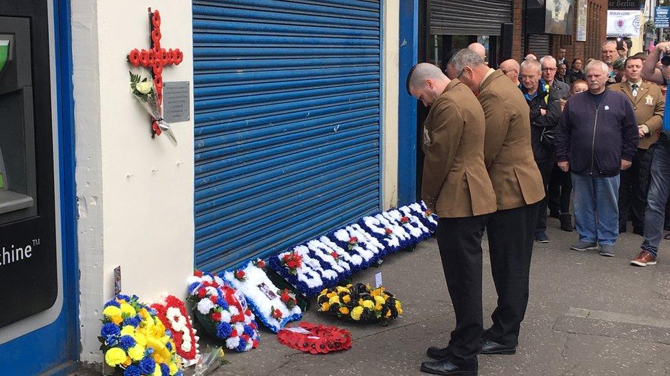 Wreaths laid outside Shankill bombing scene