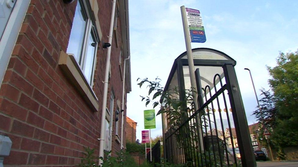 Bus shelter blocking house in Langley Mill