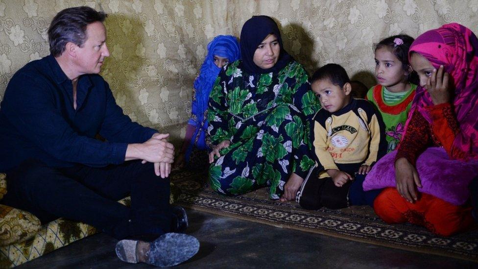 David Cameron with Syrian refugees in Lebanon