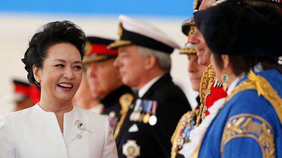 Chinese first lady Peng Liyuan greets dignitaries